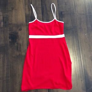 A fitted red dress with white strip